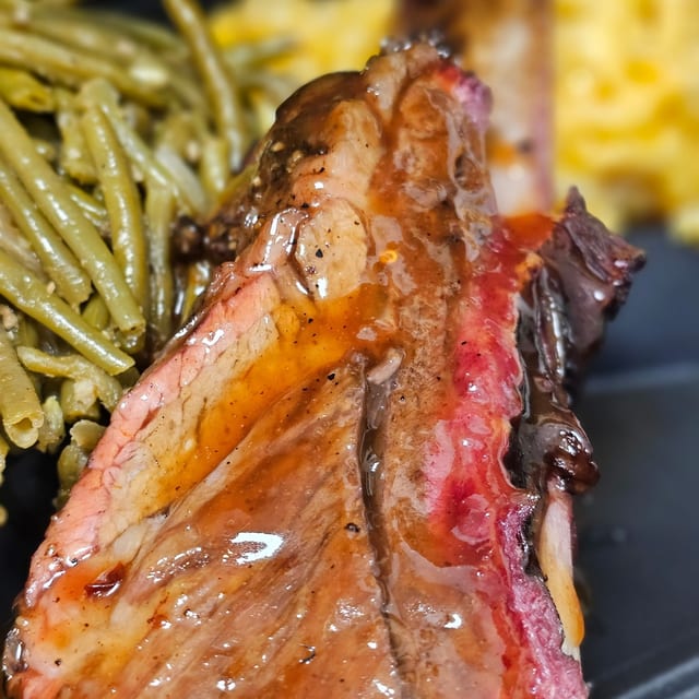 Dino Beef Bone Platter with two sides.