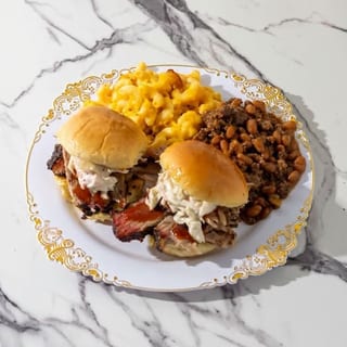 2 Pulled Pork Tacos or Sliders with Two Sides