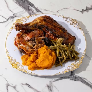Chicken and Pulled Pork Combo with two sides